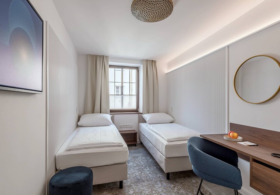 Zimmer mit zwei Einzelbetten